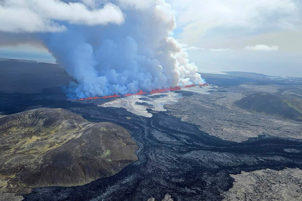 Aerial view of thick curtain of smoke after volcano eruption. 