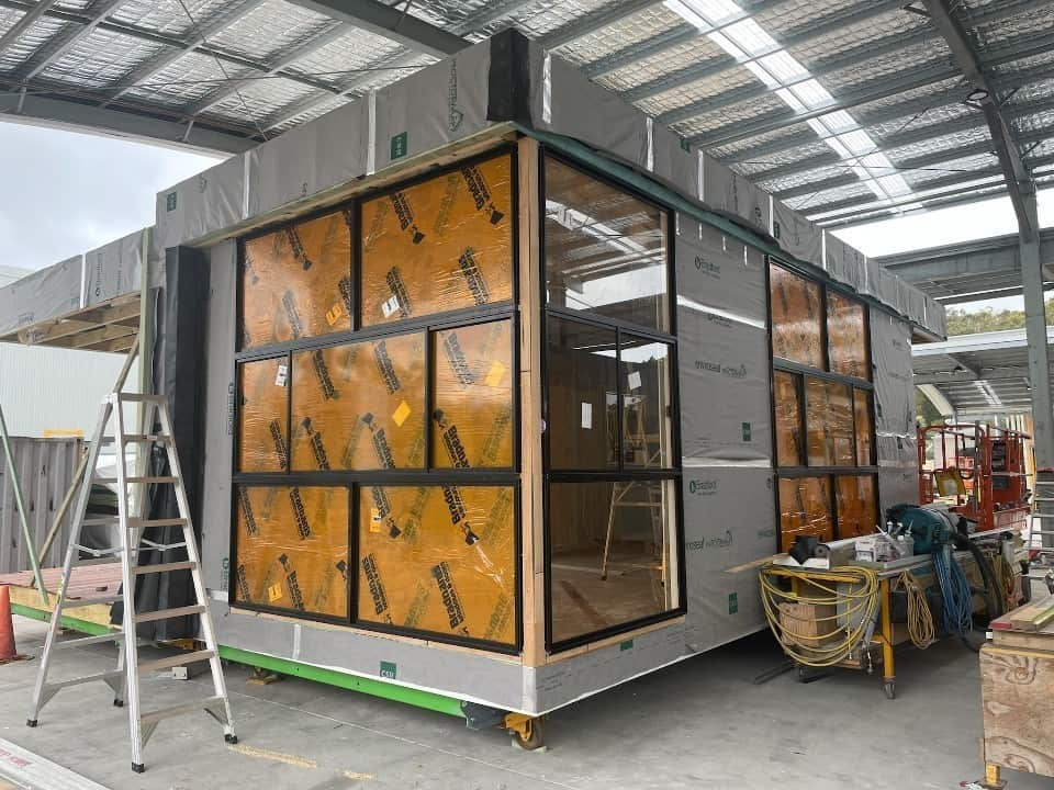 A modular house being built in a factory