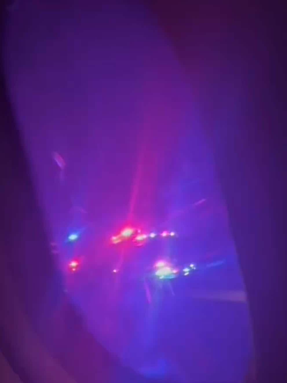 A firetruck outside a plane window show in a screengrab taken from a video.