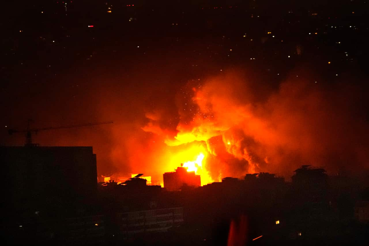 Skyline view of bombing hitting buildings