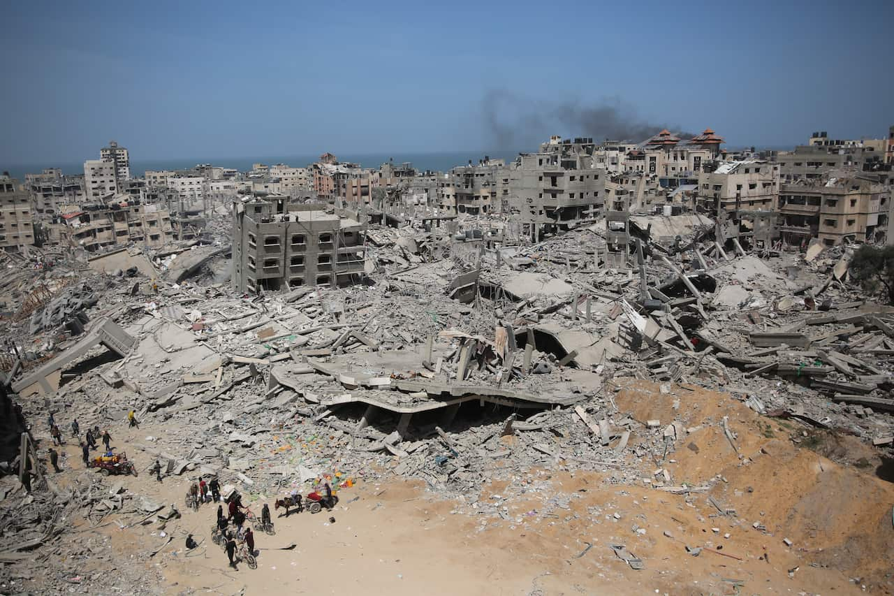 Aerial shot showing destroyed buildings.