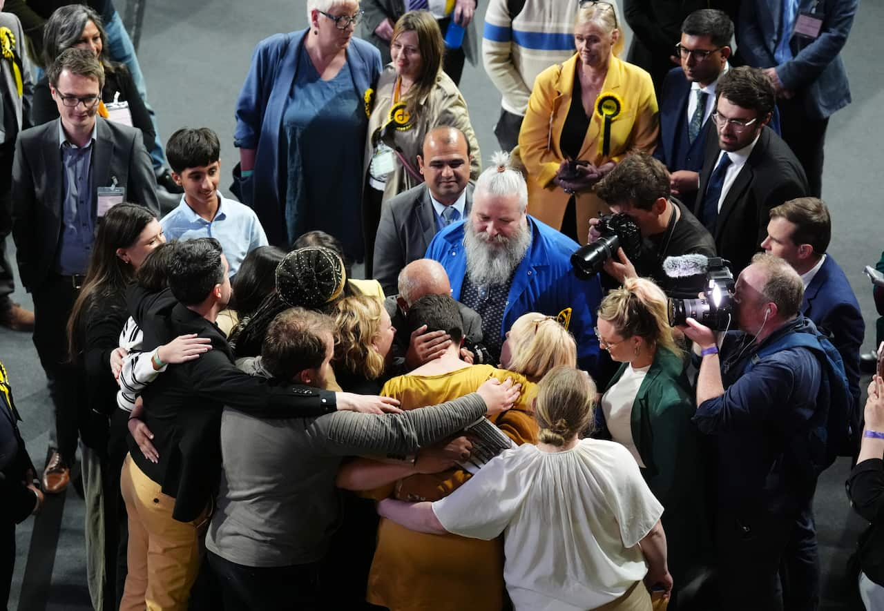 Scottish National Party members console Alison Thewliss.