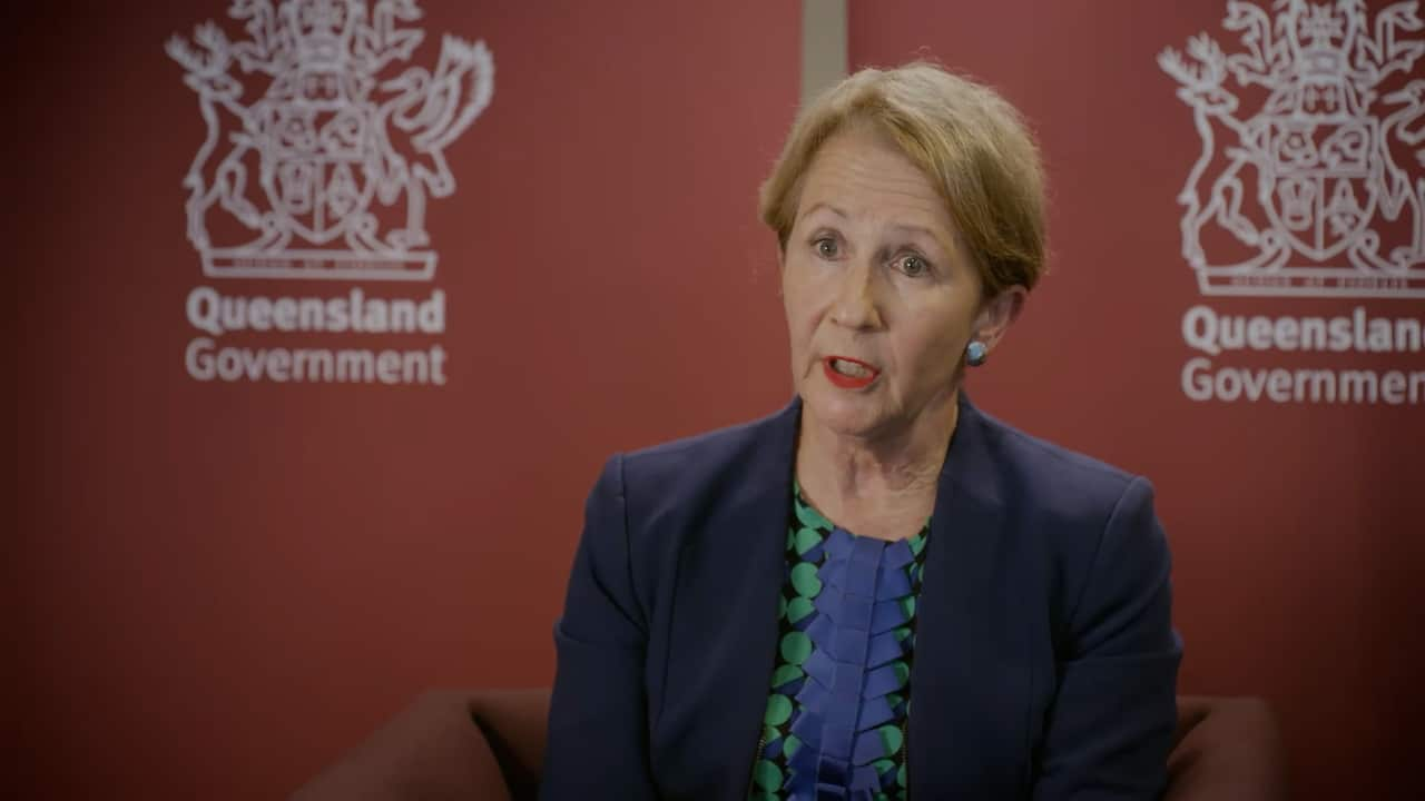 A woman in a blazer doing an interview.