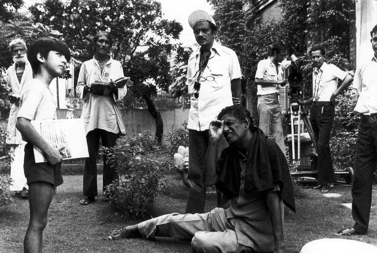 DIRECTOR SATYAJIT RAY WORKING ON THE WORLD OF APU TRILOGY