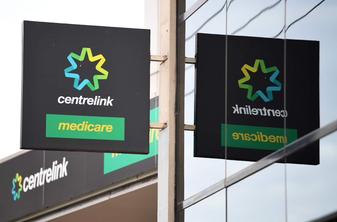 A building with a Centrelink sign attached to it.