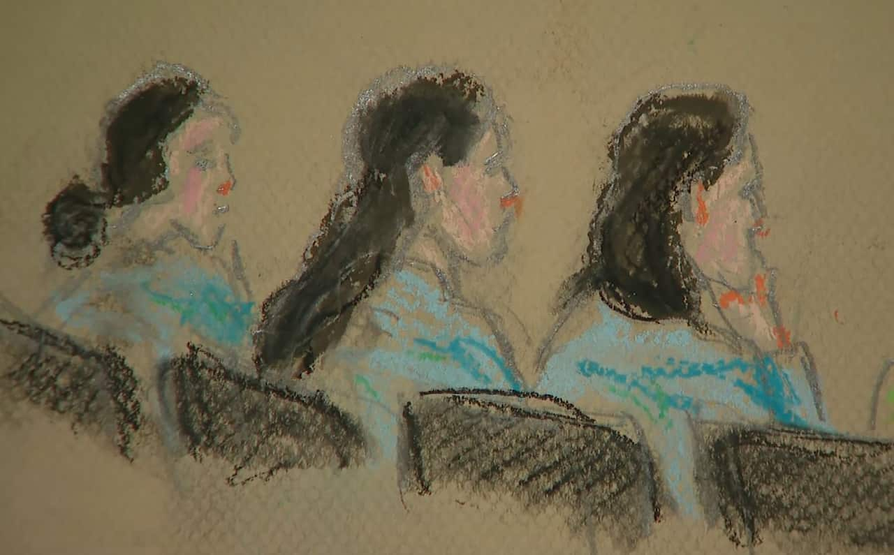 Image of court sketch showing the backs of three women sitting in courtroom.