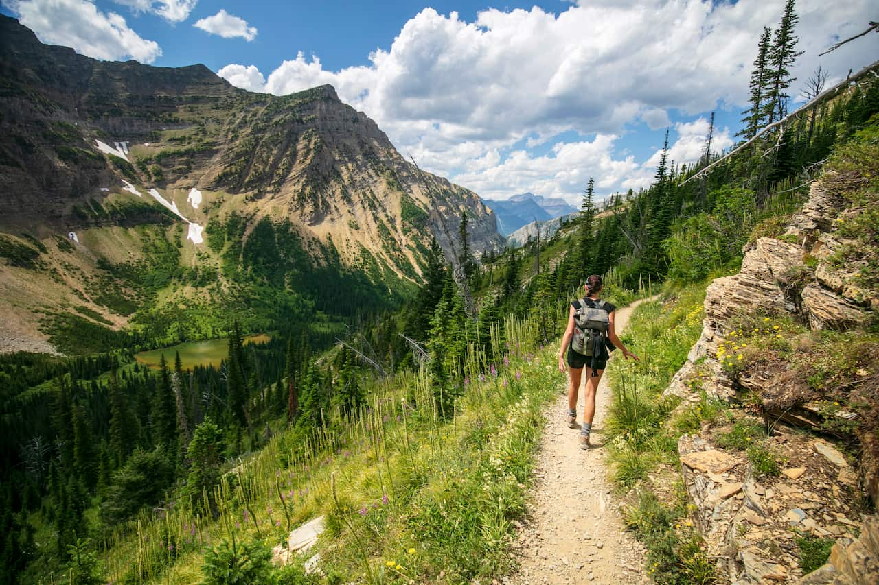 A young woman hiking in the Canadian Rockies