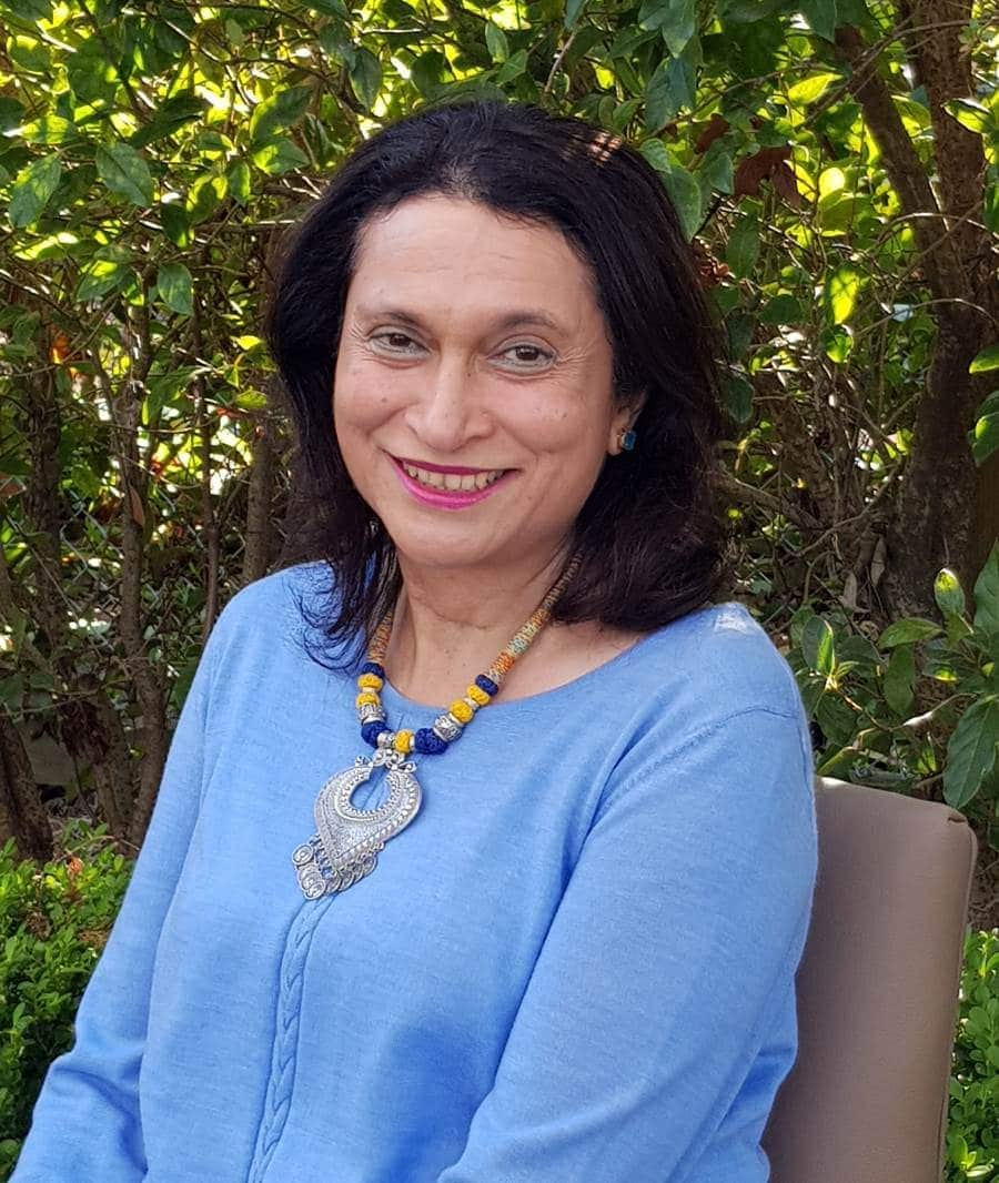 A woman wearing a blue shirt 