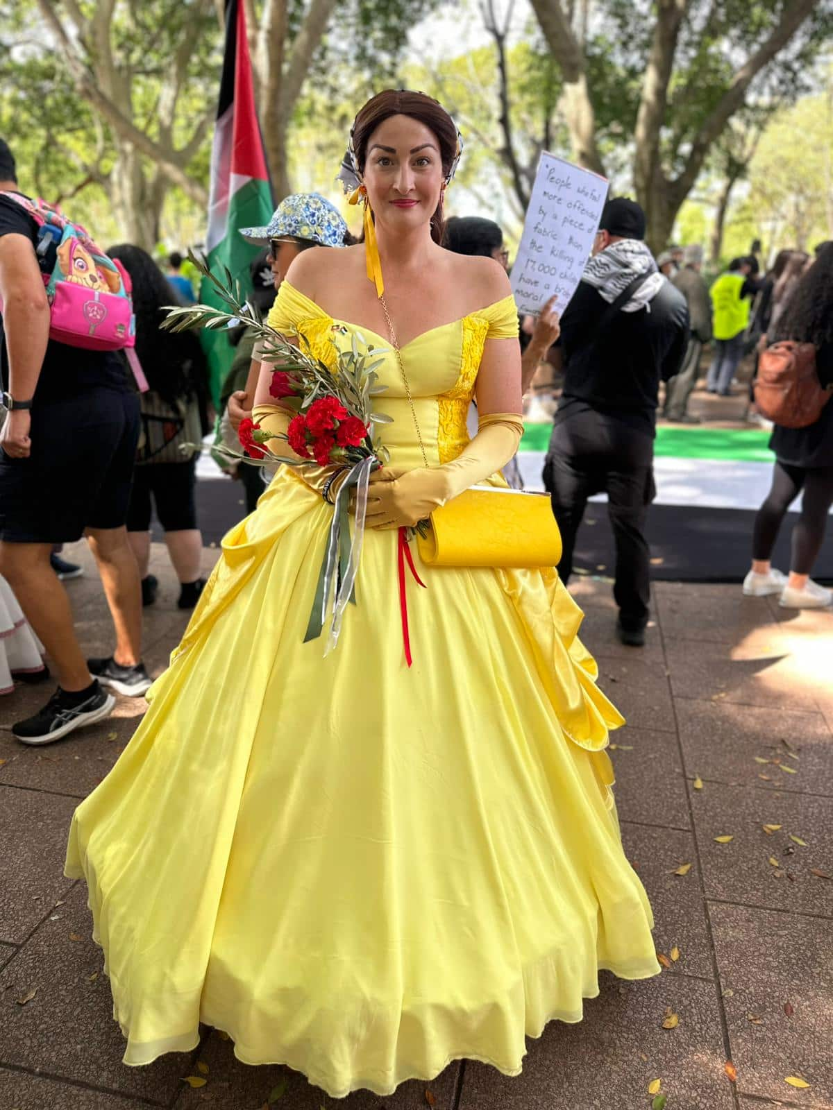 A woman in a yellow princess dress