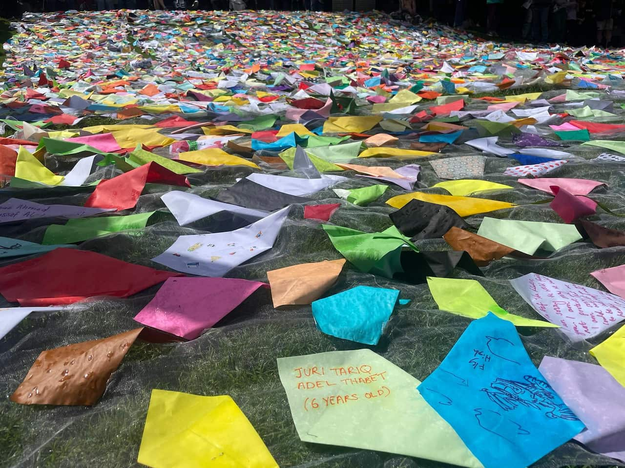 Paper kites with the names of Palestinian children